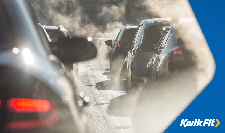 early morning traffic with exhaust fumes