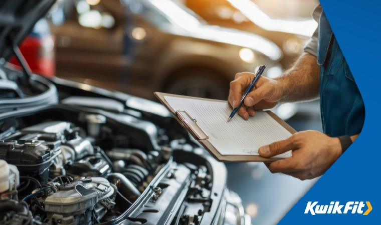 vehicle being check by a kwik fit technician