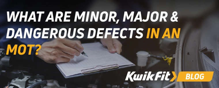 technician inspecting car during MOT